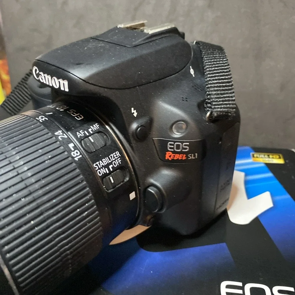 Canon EOS Rebel SL1 Digital SLR Camera Strap Lens Paperwork Cord Manual Disc C1